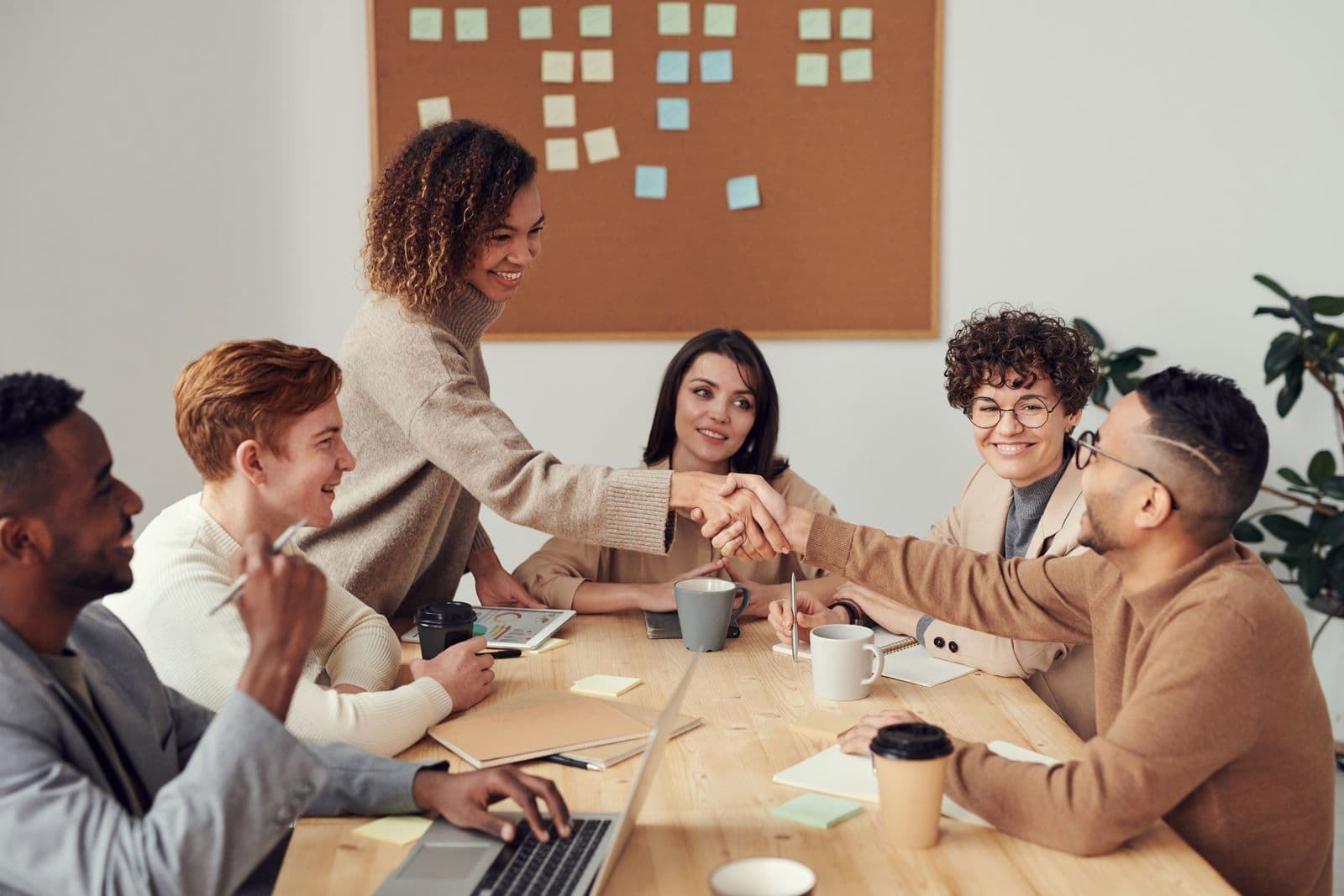 Institutional teams collaborating around a shared table